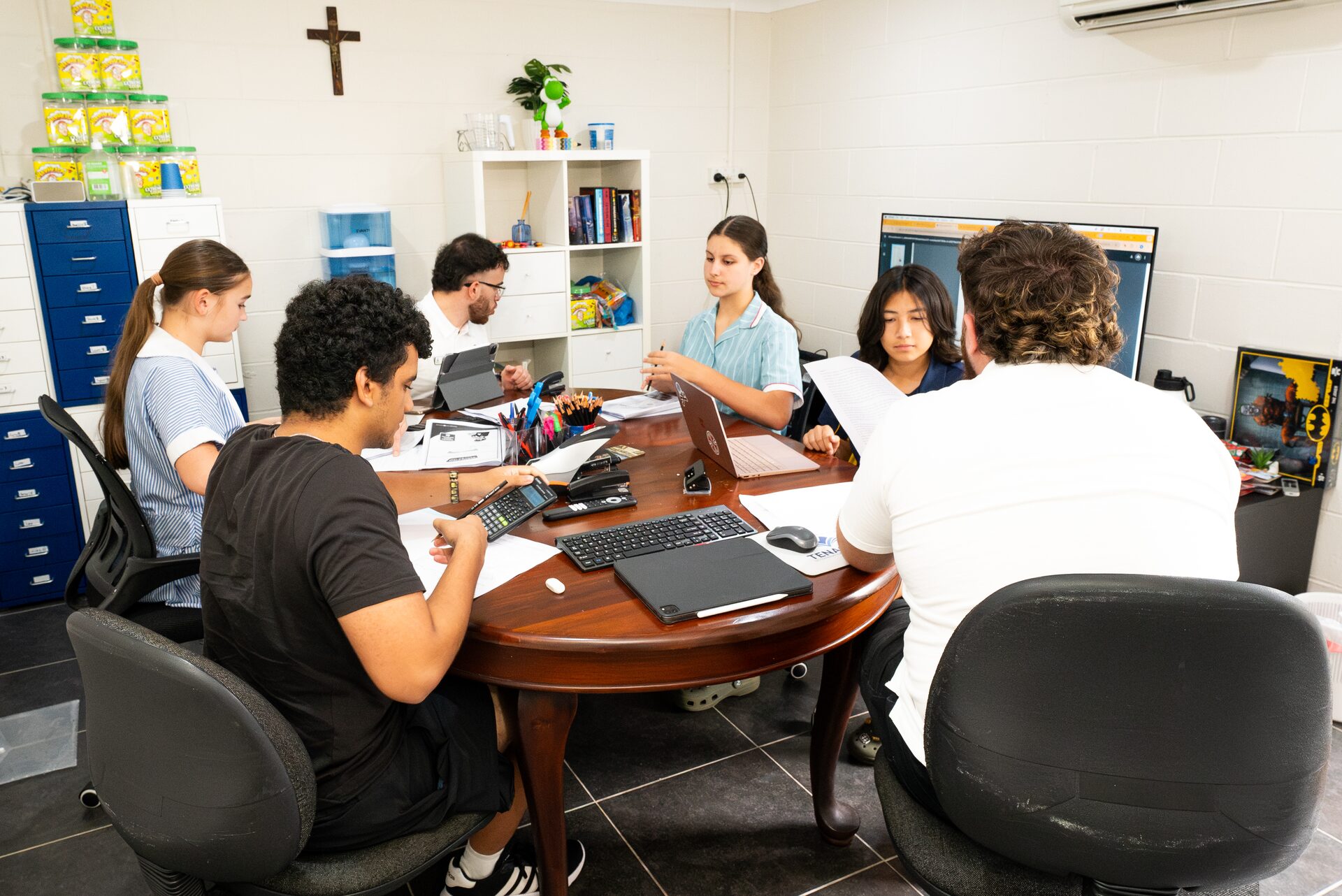 A Tenacity tutor working with a student